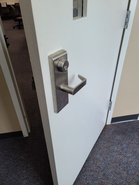 Office door with a lever lock and deadbolt
