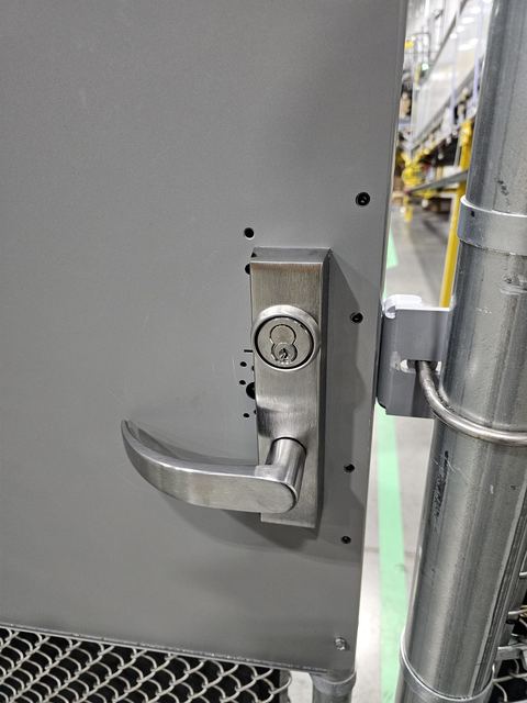 Lever lock installed on a warehouse door